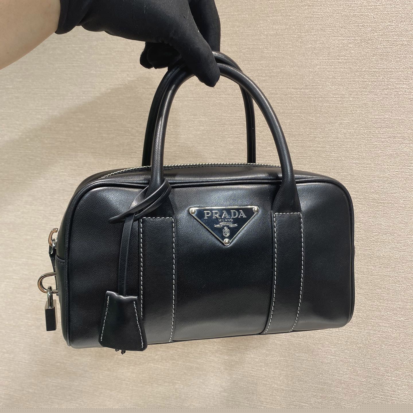Pra*a top handle bags